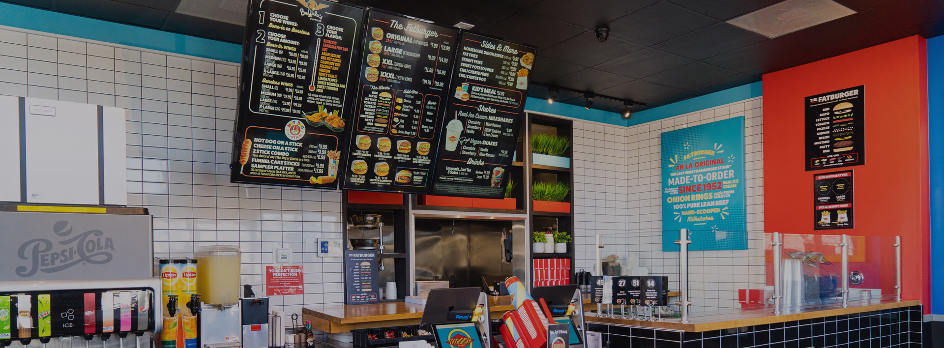 Picture of tri-branded store featuring Fatburger, Hot Dog on a stick, and Buffalo's Cafe